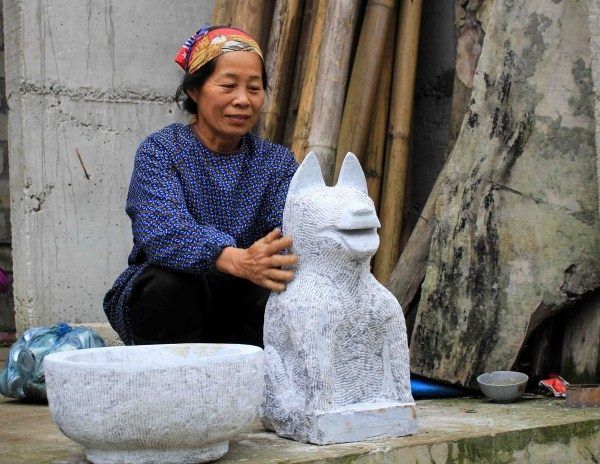 돌 개를 숭배하는 풍습 - 까오방의 타이, 응웬족의 독특한 정신 문화 특징
