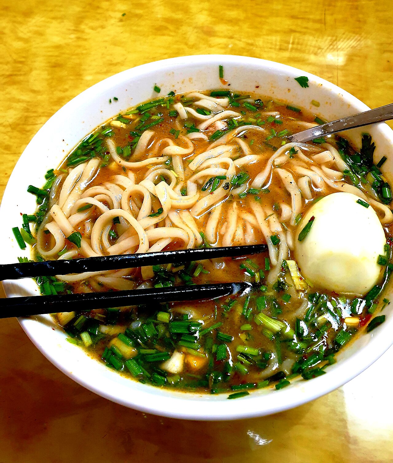 Dong Ha snakehead fish porridge — A bowl of "bed sheet" noodle soup rich in hometown flavor. - ảnh 9