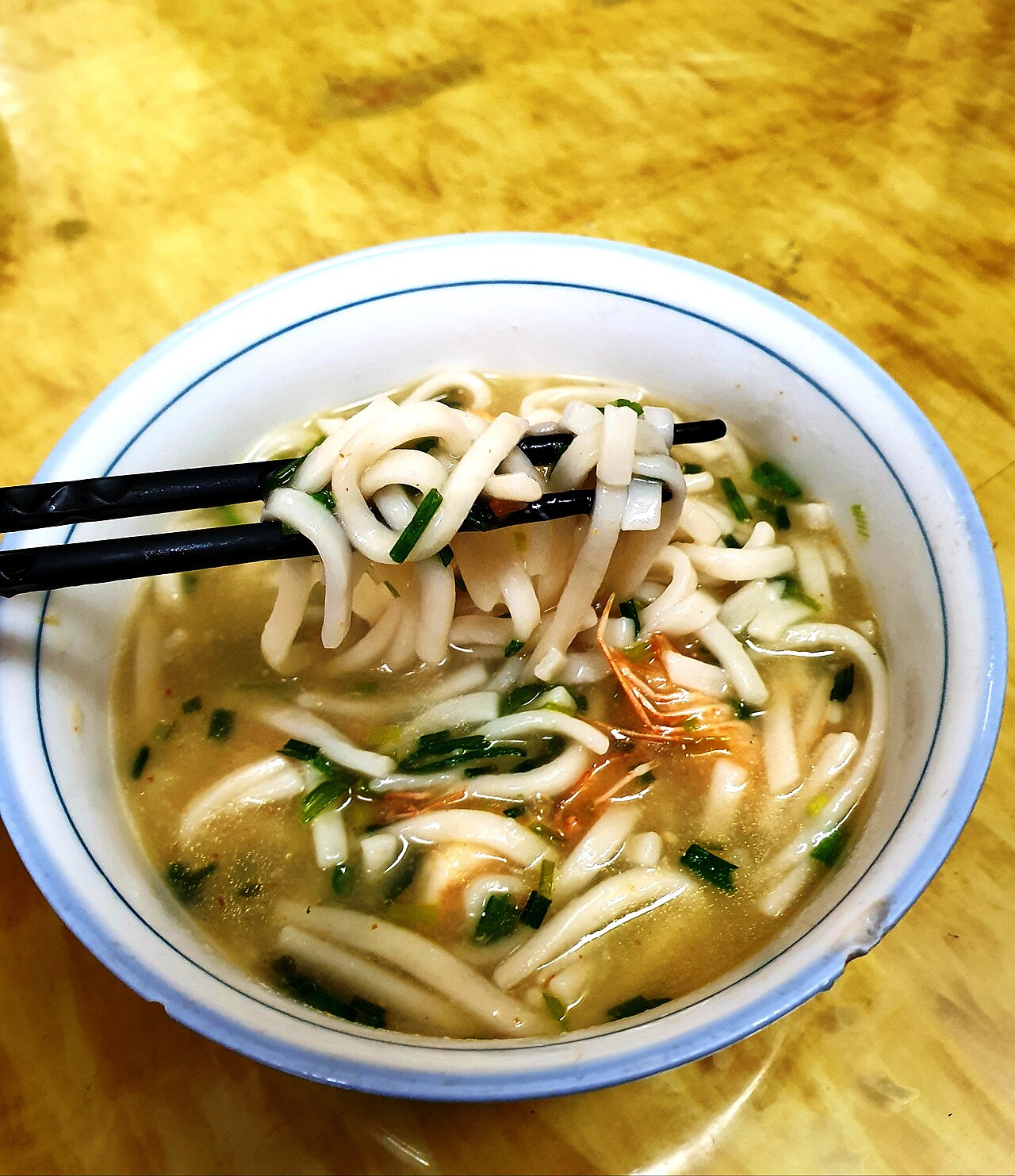 Dong Ha snakehead fish porridge — A bowl of "bed sheet" noodle soup rich in hometown flavor. - ảnh 8